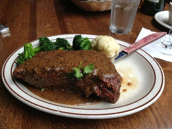 Double Musky Inn signature dishes French Pepper Steak, Crab-Stuffed Halibut with Creole Beurre Blanc Sauce, and Shrimp and Sausage Jambalaya.